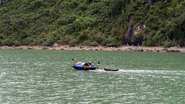 Fishermen Family in Ha Long Bay, Vietnam. 