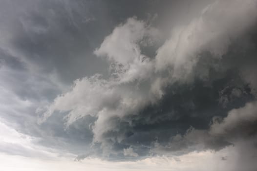 Beginning of the  storm with small tornado above