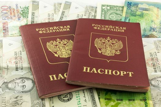 two passports of Russia against the background of money