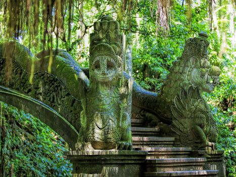Dragon sculptures in the monkey forest, Bali, Indonesia