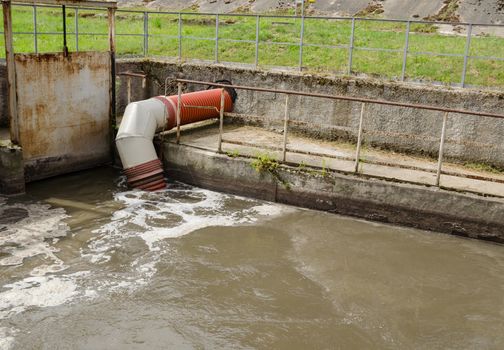 All city sewage waste water and garbage flow through pipe tube toward water cleaning treatment stages.