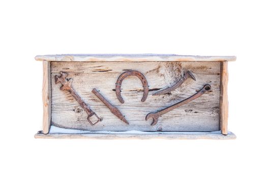 Old tools framed in red wood