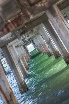 Ocean waves under beach pier