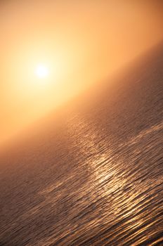 Beautiful golden sunset over the ocean tidal waters