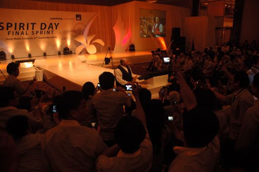 jakarta, indonesia-september 21, 2010: legless motivator giving his speech in AXA spirit day at mulia hotel senayan, jakarta-indonesia.
