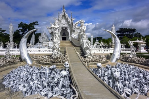 Wat Rong Khun. More well-known among foreigners as the White Temple in Chiang Rai, Thailand.