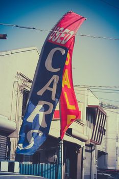 Retro Style Photo Of A Sale Sign At A Used Car Dealer