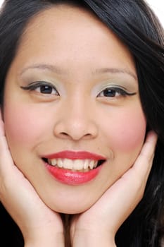 Smiling asian girl closeup of face with makeup