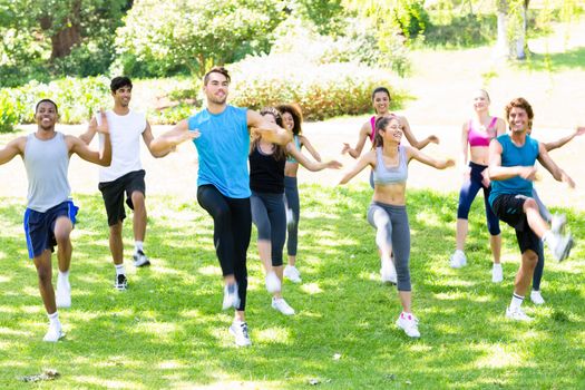Group of multiethnic people exercising in the park