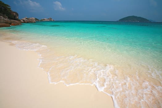 Clear water and white sand at Similan island south of Thailand.