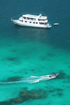 Luxery cruise on clear water at Similan island south of Thailand.