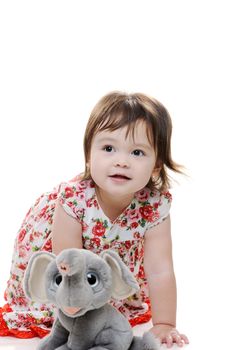 Young female toddler with fluffy toy