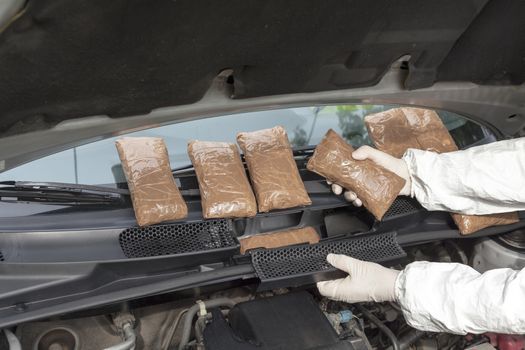 Drug smuggled in a car's engine compartment