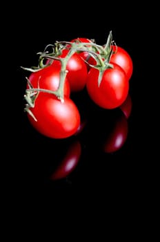 Tomatoes on black