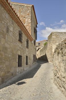 Cobblestone street in the village of Trujillo, in Caceres, Spain