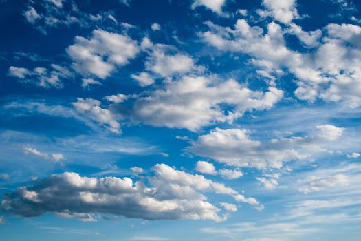 Blue Sky with white fluffy Clouds 