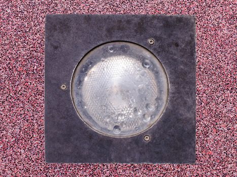 Lamp In ground red terrazzo.