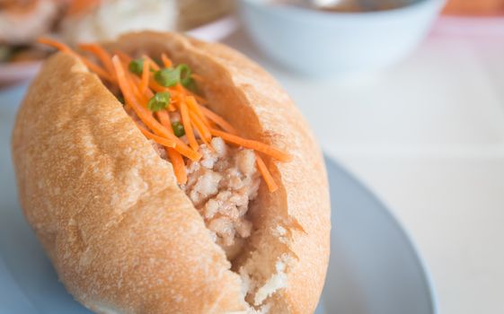 Bread pork on blue plate, Vietnamese style food.