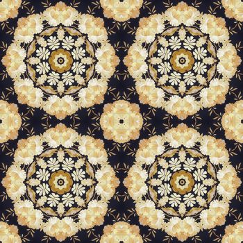 Abstract seamless artistic pattern, floral ornament, handmade applique from painted straw and bark on a black fabric background