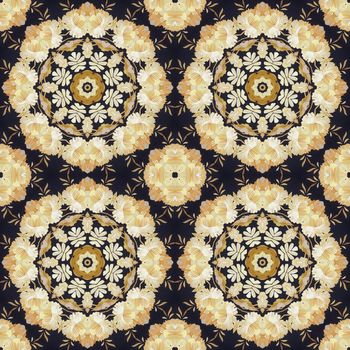 Abstract seamless artistic pattern, floral ornament, handmade applique from painted straw and bark on a black fabric background