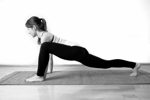 Young girl doing yoga pose