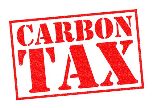 CARBON TAX red Rubber Stamp over a white background.