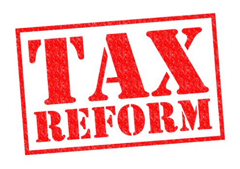 TAX REFORM red Rubber Stamp over a white background.