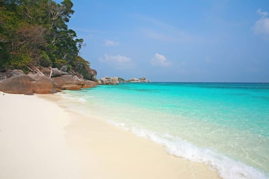 Clear water and white sand at Similan island south of Thailand.