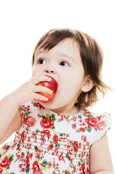 young girl biting an apple closeup portrait