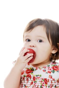 Closeup portrait of young girl eating apple