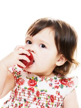 Young child enjoying fruit closeup portrait