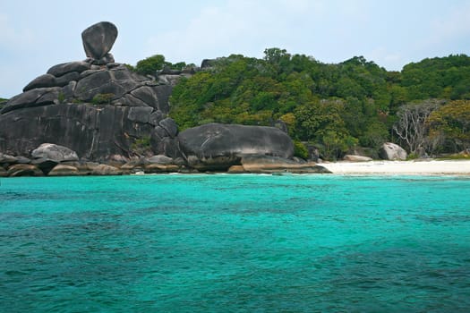 Clear water and white sand at Similan island south of Thailand.