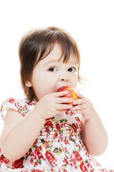 Little girl taking a big bite of red apple closeup portrait