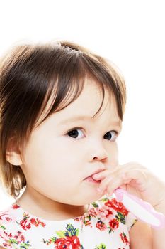 Young girl brushing teeth closeup portrait