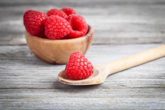 raspberries on wooden table