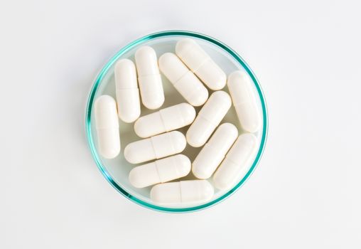 medical capsules on white background
