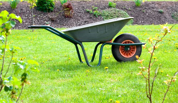 garden-wheelbarrow on green grass