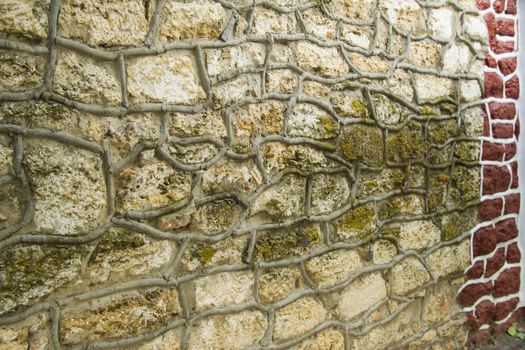 old big stone wall in the street