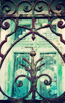 ornamental grille of an old fence in old town