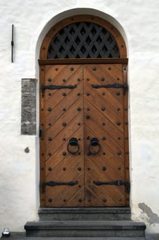 Antique door.  Close up photo made in Old  Tallinn, Estonia