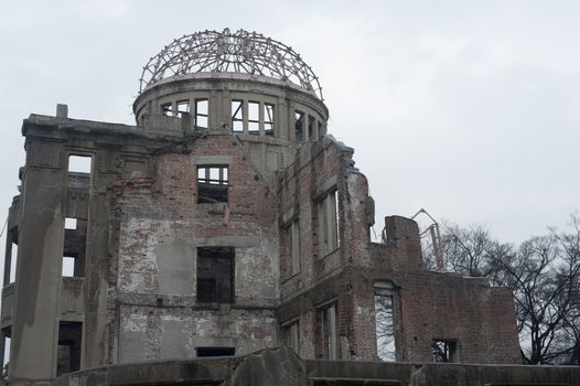 View of the stark ruins of the Hiroshima Atom Bomb Dome, one of the few buildings left standing after the bombing of Hiroshima, now part of the Peace Memorial known as the Genbaku Dome or A-Bomb Dome