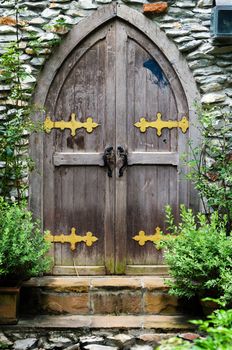 Old wooden door in castle 