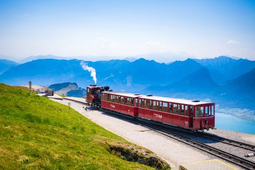 ST. WOLFGANG, AUSTRIA - AUGUST 6: Diesel train railway going to Schafberg Peak (1783m) on August 6, 2013 in St. Wolfgang.