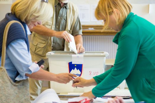 LJUBLJANA, SLOVENIA - JULY 13: People voting on parliamentary election for the 90 deputies to the National Assembly of Slovenia on June 13th, 2014, Ljubljana, Slovenia, EU.