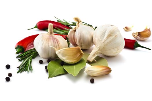 Garlic and rosemary and bay leaf isolated on white background