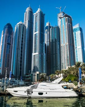 DUBAI, UAE - DECENBER 14: view of Dubai Marina. Dubai Marina is an artificial 3 km canal carved, taken on 14 december 2013nal carved along the Persian Gulf shoreline.