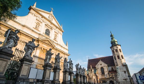 KRAKOW, POLAND - AUGUST 24: The early Baroque Church of St. Peter and St. Paul and the statues of the twelve apostles on Grodzka in the city of Krakow in Poland on 24 august 2013. Dates from 1596.