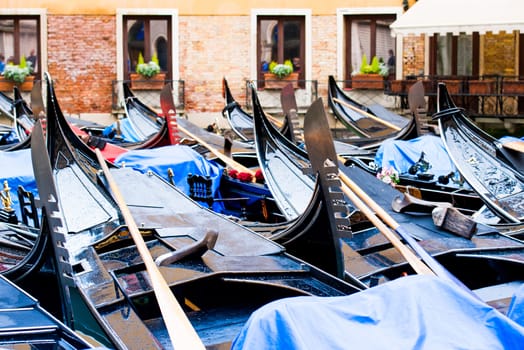 Gondolas on one of central canals in Venice
