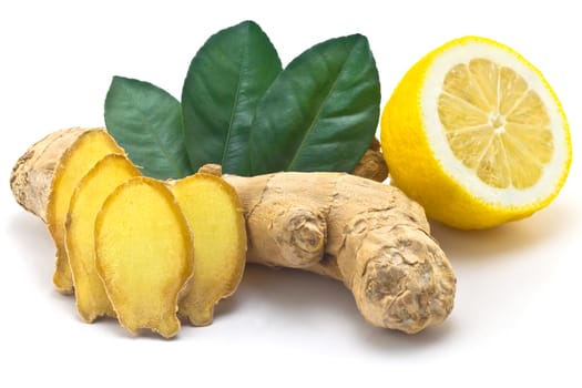 Ginger, green leaves and half a lemon