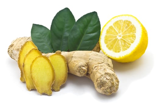 Ginger, green leaves and half a lemon